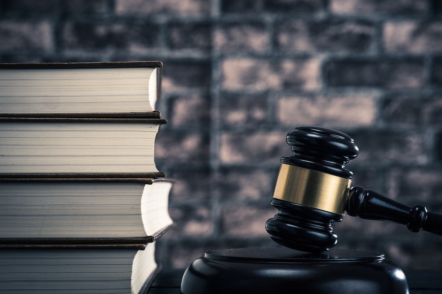 金山區刑事律師解讀偽造貨幣數額與犯罪構成